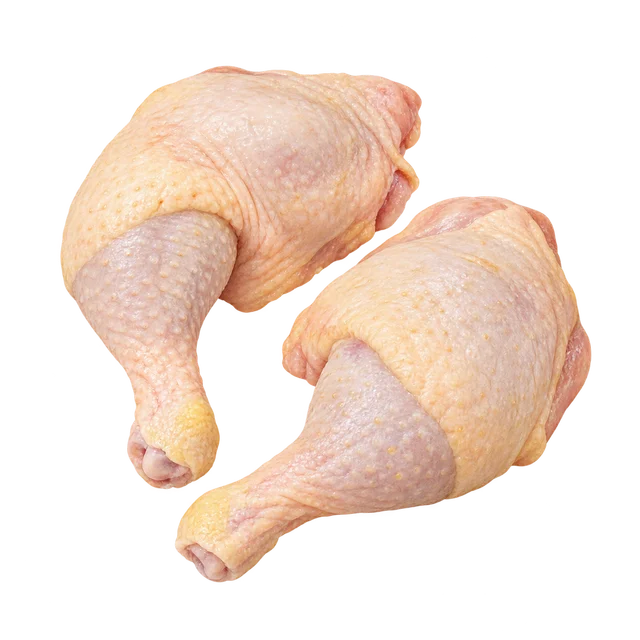 Illustration de deux cuisses de poulet crues avec leur peau